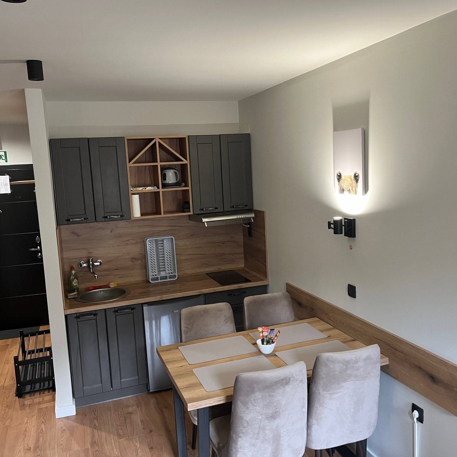 Modern kitchen with a dining table and four chairs